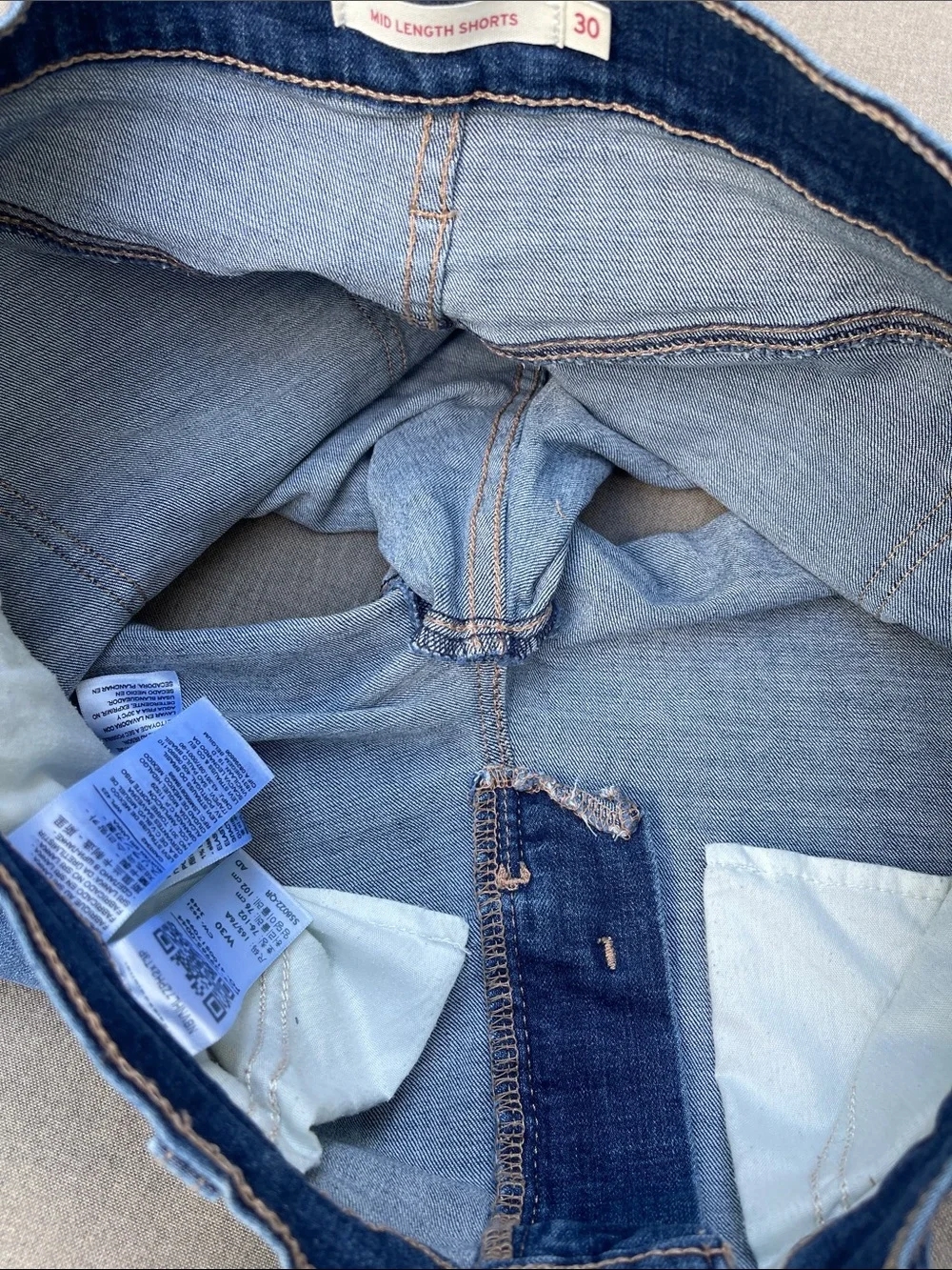 LEVI’S Mid-Length/Mid-Rise Distressed Denim Shorts